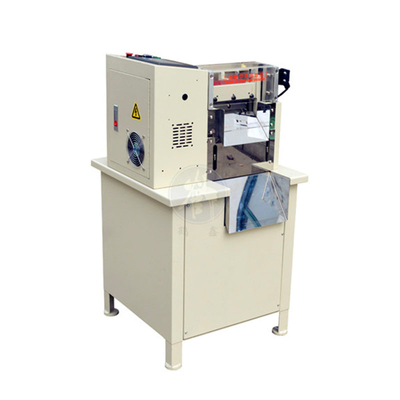 Machine de découpe de ruban à glissière pour usine de vêtements